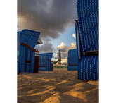Strandblick auf den Leuchtturm Warnemünde